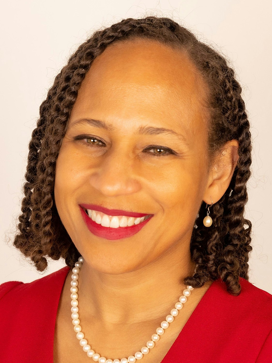 Headshot of Danielle Deane Ryan, director of equitable solutions at the Bezos Earth Fund